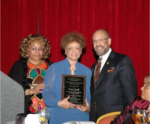 Photo of woman accepting award